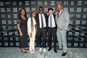 BBBSA CEO and President posing with the 2024 Bigs and Littles of the Year.